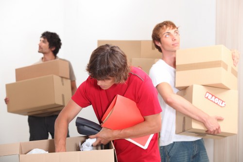 Professional office movers handling furniture and equipment in Bankside